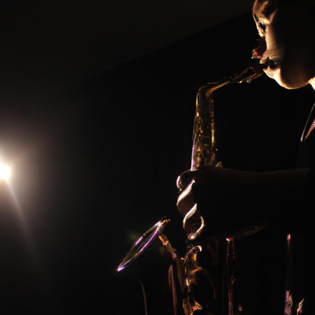 Person playing saxophone in spotlight